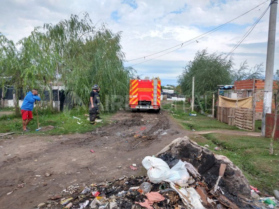 Una casa en la misma zona de donde ocurrió el homicidio fue quemada.
