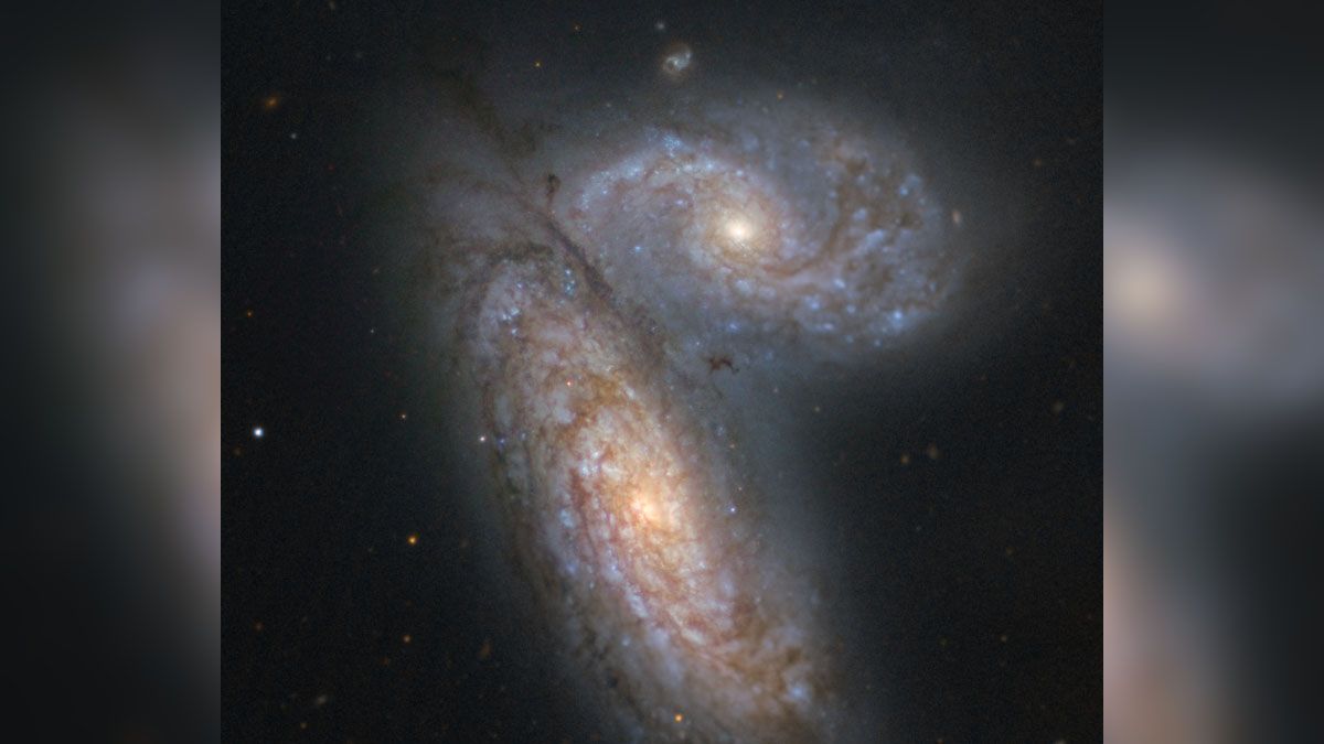 Las galaxias NGC 4567 y NGC 4568, conocidas popularmente como la