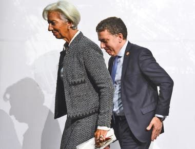 Lagarde y Dujovne, ayer, tras encabezar una conferencia de prensa