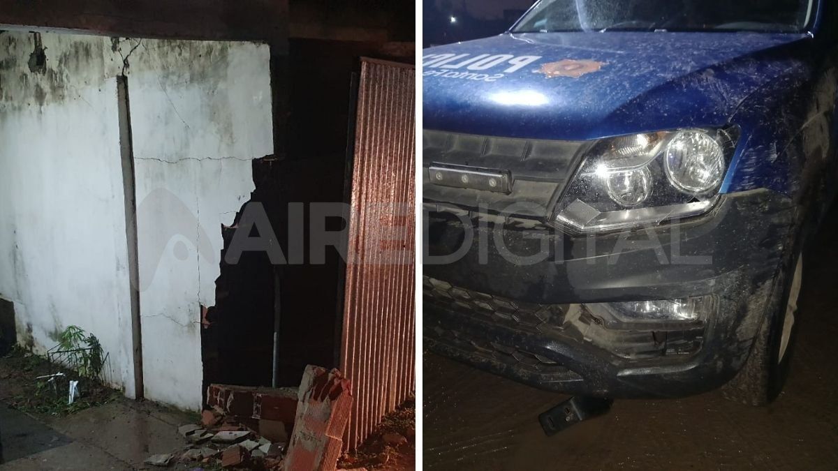Un patrullero atropelló el portón de una casa