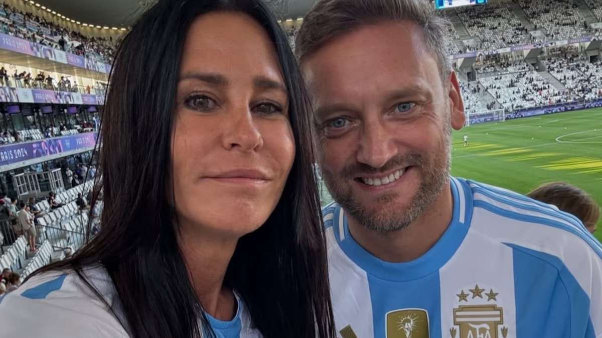 Carolina y Pablo alentando a la Selección Argentina. Carolina y Pablo alentando a la Selección Argentina.