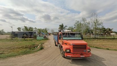 Brutal asalto en el acceso a Autopista: cinco encapuchados golpearon, arrastraron e hirieron a un camionero