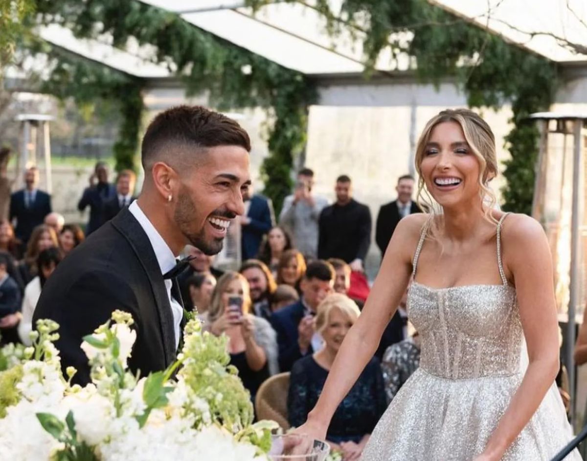 Jennifer Reina junto a Manuel Lanzini, en su casamiento. Jennifer Reina junto a Manuel Lanzini, en su casamiento.