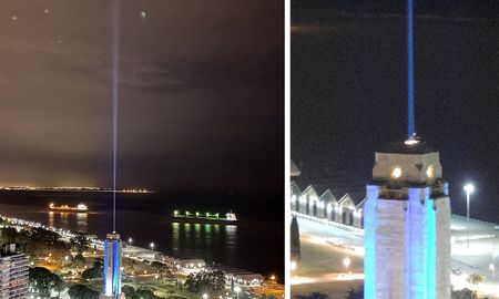 Sorpresa por un rayo de luz que salió del Monumento a la Bandera y señaló al cielo Sorpresa por un rayo de luz que salió del Monumento a la Bandera y señaló al cielo