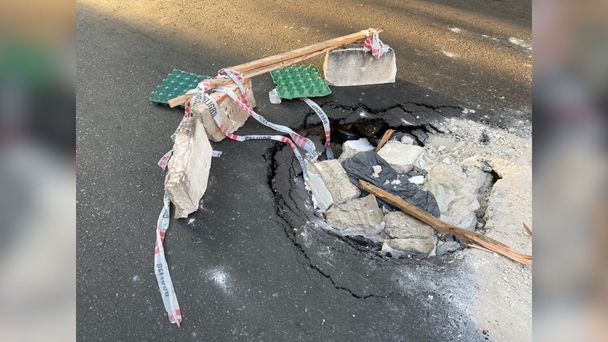 Adentro del pozo pusieron cascotes, intentando tapar de manera provisoria el hundimiento.