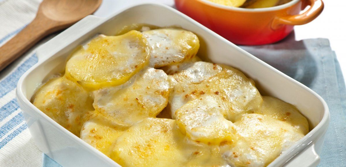 Papas a la crema gratinadas con queso.