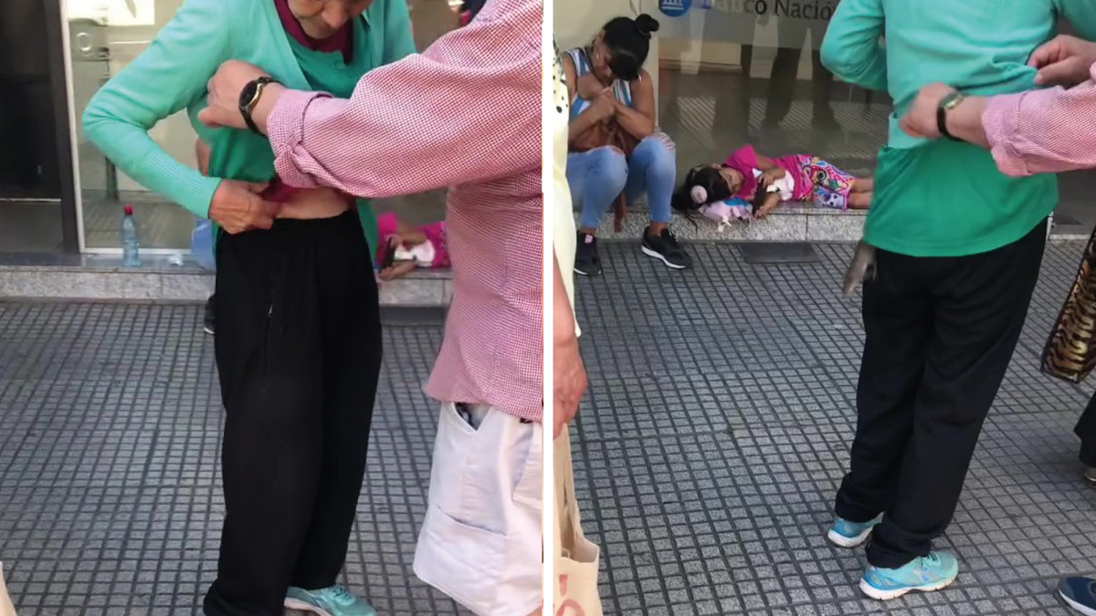 Video: estaba en la fila de un banco y se le metió una rata en la ropa