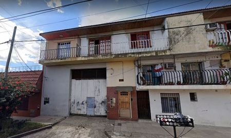 La entrada del departamento donde ocurrió el crimen La entrada del departamento donde ocurrió el crimen