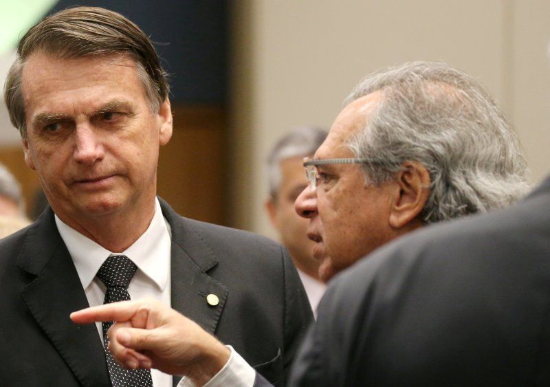 El presidente Jair Bolsonaro y el ministro de Economía Paulo Guedes