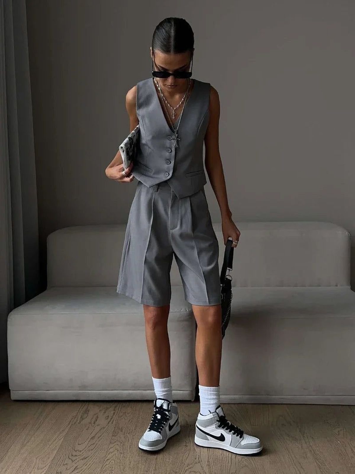 Un chaleco combinado con bermudas Un chaleco combinado con bermudas