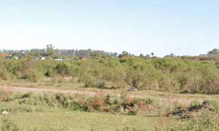 La zona por donde apareció el auto incendiado, al oeste de Rosario. La zona por donde apareció el auto incendiado, al oeste de Rosario.