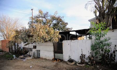 La beba Geraldine Gómez murió en el criminal ataque a balazos contra esta vivienda en Villa Gobernador Gálvez. La beba Geraldine Gómez murió en el criminal ataque a balazos contra esta vivienda en Villa Gobernador Gálvez.