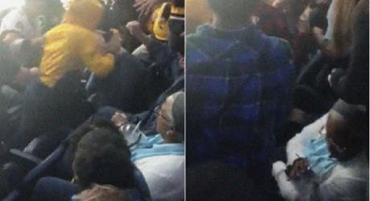 El video del día: una mujer sigue bebiendo tranquila en medio de una brutal pelea