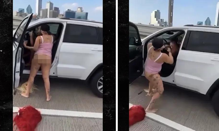 Una mujer semidesnuda fue filmada colgando de un auto en plena autopista Una mujer semidesnuda fue filmada colgando de un auto en plena autopista