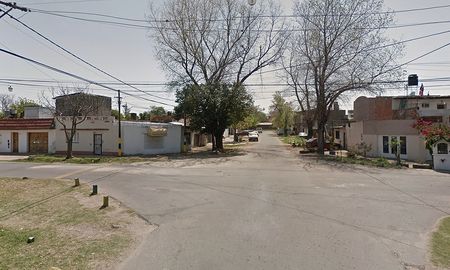 La víctima presentaba heridas de bala y signos de haber sido golpeado.