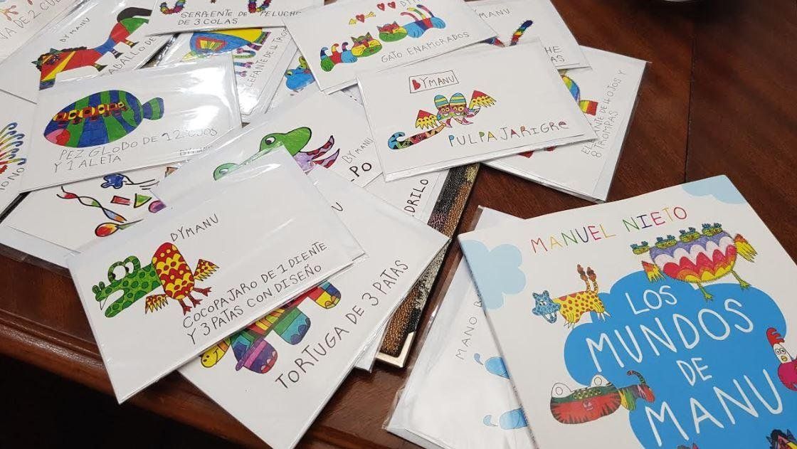 5bef0f163939e_LIbro_y_tarjetas_Manu.jpg