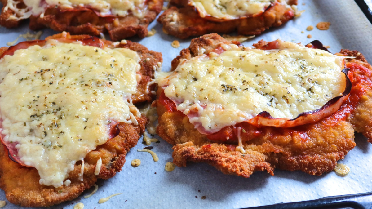 Cómo hacer las perfectas milanesas a la napolitana. Cómo hacer las perfectas milanesas a la napolitana.