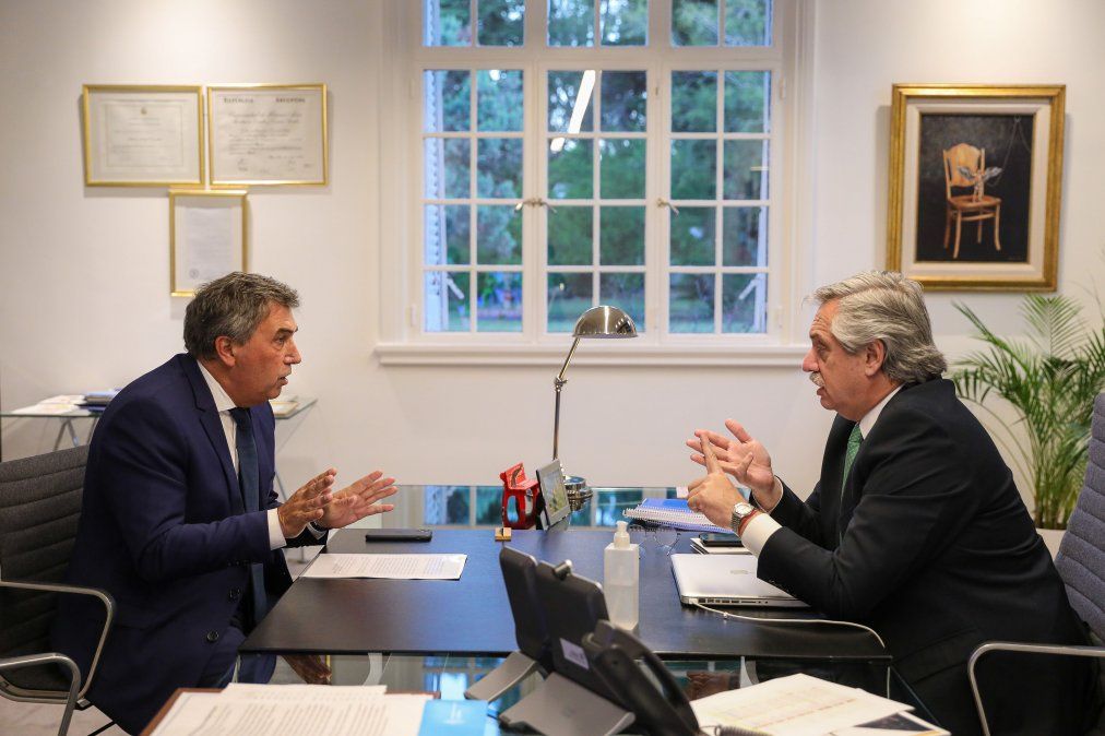 Claudio Ambrosini, presidente de Enacom y Alberto Fernández. Foto NA.