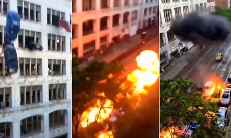Autos caen desde lo más alto de edificio y explotan al chocar en el pavimento Autos caen desde lo más alto de edificio y explotan al chocar en el pavimento