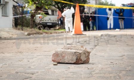 Peritos levantaron algunas vainas servidas de la escena del crimen de Demarchi. Peritos levantaron algunas vainas servidas de la escena del crimen de Demarchi.