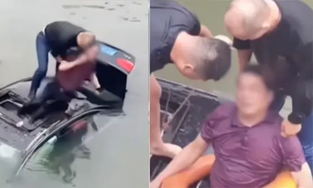 El hombre que observó la situación se tiró al agua, rompió el techo del coche y le salvó la vida a la personas que había quedado atrapada. El hombre que observó la situación se tiró al agua, rompió el techo del coche y le salvó la vida a la personas que había quedado atrapada.