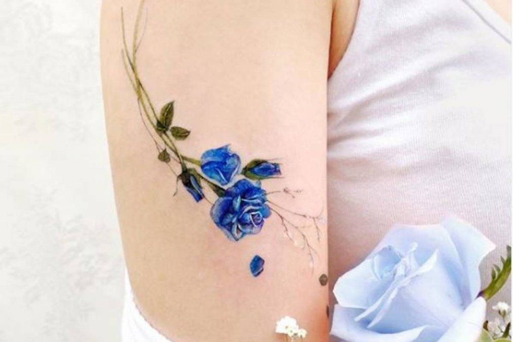 Tatuajes de rosas para mujeres fuertes.