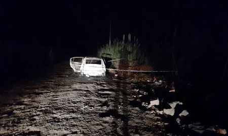 Penumbra: el vehículo de la víctima tras el fuego. Penumbra: el vehículo de la víctima tras el fuego.