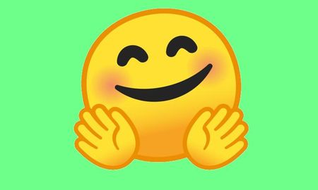 La carita amarilla con las manos abiertas de WhatsApp causa perturbación por este motivo